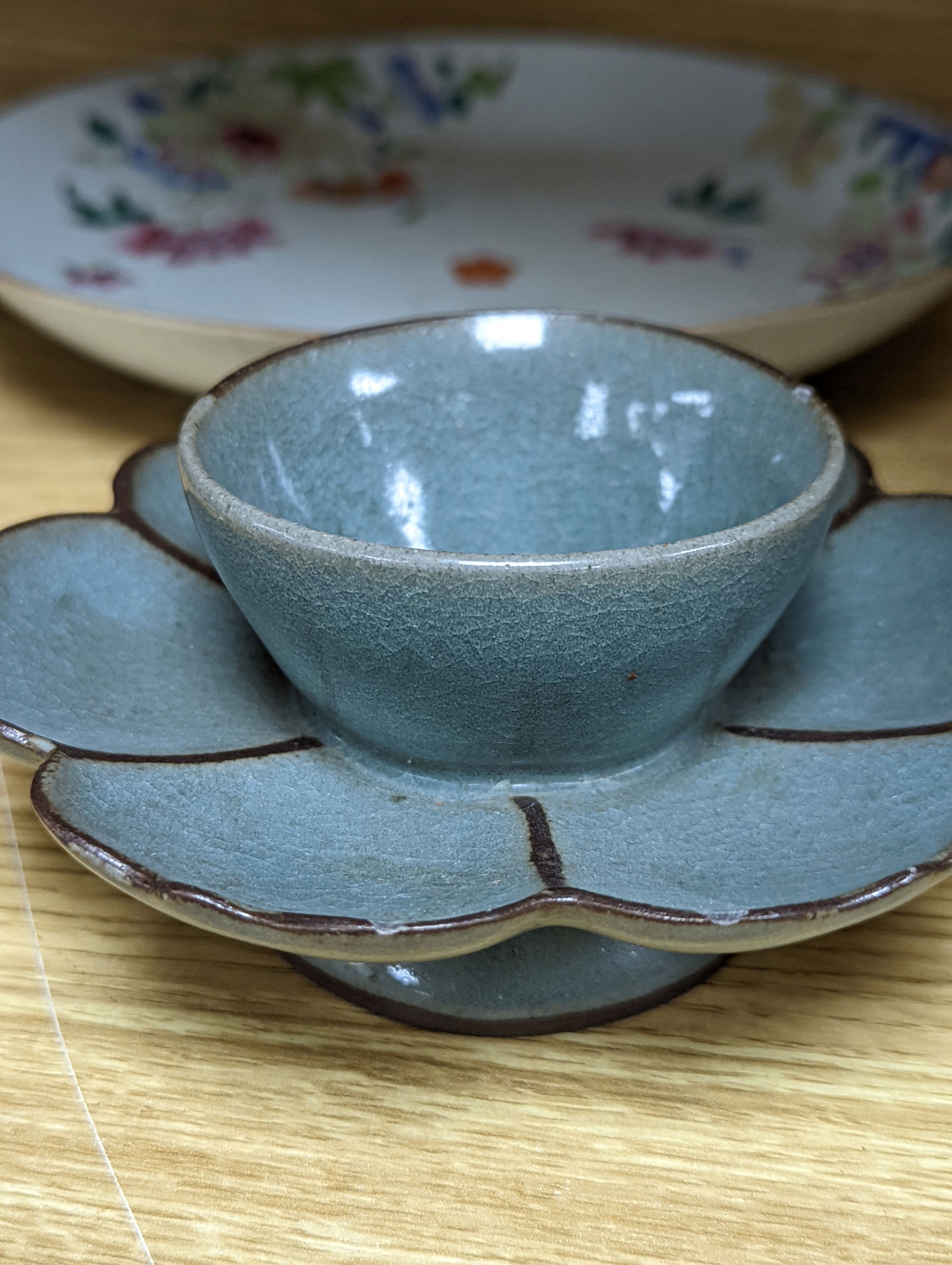 An 18th century Chinese famille rose dish, crackle-glaze stem cup, Beijing glass tea bowl and a Chinese Imari plate. Largest 24cm